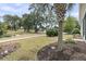 Scenic community park with landscaped grounds, mature trees, and walking paths at 1472 Longspur Dr, Mount Pleasant, SC 29466