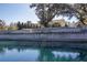 A serene image of the Oyster Point community entrance sign reflecting on the water at 1472 Longspur Dr, Mount Pleasant, SC 29466