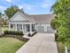 Charming single-story home with a manicured front yard and a two-car garage at 1472 Longspur Dr, Mount Pleasant, SC 29466