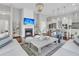 Cozy living room featuring a fireplace, open floor plan, and modern decor at 1472 Longspur Dr, Mount Pleasant, SC 29466