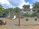 Playground with slide, climbing structure, and swings, offering children a fun and active recreation space at 1472 Longspur Dr, Mount Pleasant, SC 29466