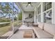 Screened porch featuring seating and decor with views of the outdoors at 1472 Longspur Dr, Mount Pleasant, SC 29466