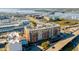 Aerial view of building with surrounding roadways, bridges, and water views at 150 Bee St # 507, Charleston, SC 29401