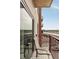 Enjoy the view of the highway from the balcony, perfect for relaxation or dining al fresco, reflecting in the window at 150 Bee St # 507, Charleston, SC 29401