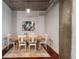 Charming dining room with a wooden table, chairs, a modern light fixture and stylish rug, perfect for entertaining at 150 Bee St # 507, Charleston, SC 29401