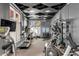 The communal gym featuring treadmills, ellipticals, stationary bikes and weights at 150 Bee St # 507, Charleston, SC 29401