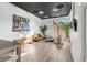 A communal room with a lounge area, table with seating, and plenty of windows at 150 Bee St # 507, Charleston, SC 29401