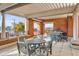 Brick patio area with outdoor seating and a grill with a view of the city at 150 Bee St # 507, Charleston, SC 29401