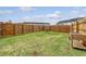 Spacious backyard with lush green grass and a wood fence provides ample outdoor space at 152 Kirkland St, Goose Creek, SC 29445