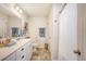 This bathroom offers a single vanity and shower with modern fixtures and a neutral palette at 152 Kirkland St, Goose Creek, SC 29445