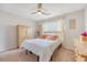 This bedroom offers a light and airy feel, with a ceiling fan and plenty of natural light streaming through the windows at 152 Kirkland St, Goose Creek, SC 29445