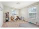 This bedroom offers ample natural light through the windows, providing a welcoming atmosphere at 152 Kirkland St, Goose Creek, SC 29445