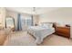 Comfortable bedroom with ceiling fan, large bed, and lots of natural light at 152 Kirkland St, Goose Creek, SC 29445