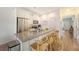 Bright kitchen with granite countertops, stainless steel appliances, and bar stool seating at 152 Kirkland St, Goose Creek, SC 29445
