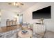 Comfortable living room with modern furnishings and decor, and large screen television at 152 Kirkland St, Goose Creek, SC 29445