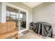 Covered patio with outdoor seating and grill, perfect for enjoying the backyard at 152 Kirkland St, Goose Creek, SC 29445