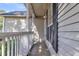 Inviting front porch featuring white railing, offering a welcoming entrance at 153 Corsair St, Summerville, SC 29483