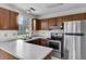 Functional kitchen with stainless steel appliances and ample counter space at 153 Corsair St, Summerville, SC 29483