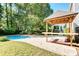 Backyard featuring a pool, gazebo and a well maintained patio area at 1541 Diamond Blvd, Mount Pleasant, SC 29466