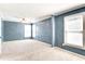 Large carpeted bedroom with ample natural light from several windows at 1541 Diamond Blvd, Mount Pleasant, SC 29466
