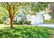 Beautiful two-story home with a three-car garage and a lush green lawn at 1541 Diamond Blvd, Mount Pleasant, SC 29466