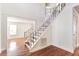 Elegant foyer staircase with hardwood floors and an open floor plan at 1541 Diamond Blvd, Mount Pleasant, SC 29466