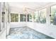Bright sunroom with multiple windows offering ample natural light and outdoor views at 1541 Diamond Blvd, Mount Pleasant, SC 29466