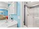 Full bathroom featuring vanity with sink, wall cabinets, and step-in shower at 1619 Live Oak Park, Johns Island, SC 29455