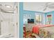 Bright, colorful bedroom featuring access to private bathroom and private balcony at 1619 Live Oak Park, Johns Island, SC 29455