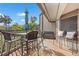 Cozy outdoor deck with patio furniture and seating, perfect for relaxing and enjoying the views at 1619 Live Oak Park, Johns Island, SC 29455
