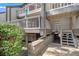 Condo exterior with multiple decks, stairs, green space, and wooden beams at 1619 Live Oak Park, Johns Island, SC 29455