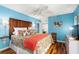 Serene main bedroom featuring colorful bedding, hardwood floors, and a ceiling fan at 1619 Live Oak Park, Johns Island, SC 29455