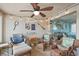 Relaxing sunroom with wicker seating and stylish decor, perfect for unwinding at 1619 Live Oak Park, Johns Island, SC 29455