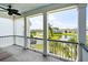 Balcony overlooking a picturesque pond and street with well maintained surrounding houses at 1644 Fort Palmetto Cir, Mount Pleasant, SC 29466