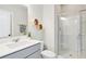 Stylish bathroom with gray vanity, white countertops, and glass-enclosed shower at 1644 Fort Palmetto Cir, Mount Pleasant, SC 29466
