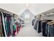 Large walk-in closet featuring custom shelves, hanging racks, and natural lighting at 1644 Fort Palmetto Cir, Mount Pleasant, SC 29466
