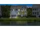 Charming two-story home with a large yard overlooking the pond at 1644 Fort Palmetto Cir, Mount Pleasant, SC 29466