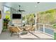 Inviting screened-in patio with a fireplace and comfortable seating for outdoor relaxation at 1644 Fort Palmetto Cir, Mount Pleasant, SC 29466
