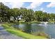 Pond view of community with beautiful surrounding trees and a water fountain at 1644 Fort Palmetto Cir, Mount Pleasant, SC 29466