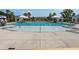 Large community swimming pool with lounge chairs, umbrellas and a shallow wading area for children at 1644 Fort Palmetto Cir, Mount Pleasant, SC 29466