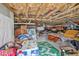 Unfinished basement with exposed pipes, packed boxes and an unfinished ceiling at 169 Jackson St, Charleston, SC 29403