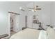 Bright bedroom with a ceiling fan, peloton exercise bike, and access to closet; perfect space for exercise at 169 Jackson St, Charleston, SC 29403