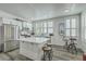 Modern kitchen with a large island, stainless steel appliances, and bar stool seating at 169 Jackson St, Charleston, SC 29403