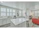 Stylish kitchen with a large island, quartz countertops, and stainless steel appliances at 169 Jackson St, Charleston, SC 29403
