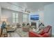 Bright living room with fireplace, plush seating, and ample natural light at 169 Jackson St, Charleston, SC 29403