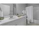 Well-lit bathroom featuring a vanity with sink and storage, a toilet, and a shower-tub combination at 1735 Telfair Way, Charleston, SC 29412