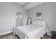 Cozy bedroom with natural light, a full-length mirror, and a comfortable bed for peaceful nights at 1735 Telfair Way, Charleston, SC 29412