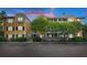 Inviting condominium building with an ample parking lot and well-kept landscaping at 1735 Telfair Way, Charleston, SC 29412