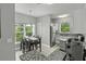 Open kitchen and dining area with granite countertops, stainless steel appliances, and plenty of natural light at 1735 Telfair Way, Charleston, SC 29412