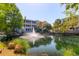 Beautiful view of a pond with a fountain in front of the condominiums at 1735 Telfair Way, Charleston, SC 29412